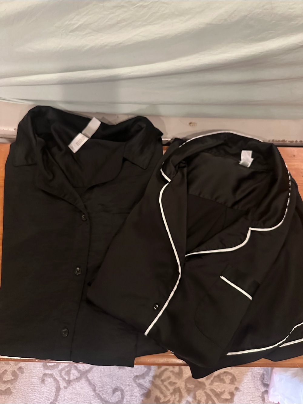 Bundle of black satin like pajamas